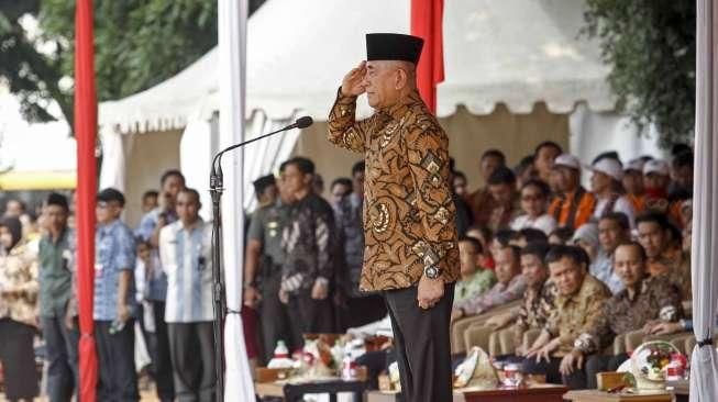 Ribuan elemen masyarakat melakukan Apel Kebhinekaan Lintas Iman Bela Negara di Lapangan Banteng, Jakarta, Minggu (17/1/2016). [Suara.com/Kurniawan Mas'ud]