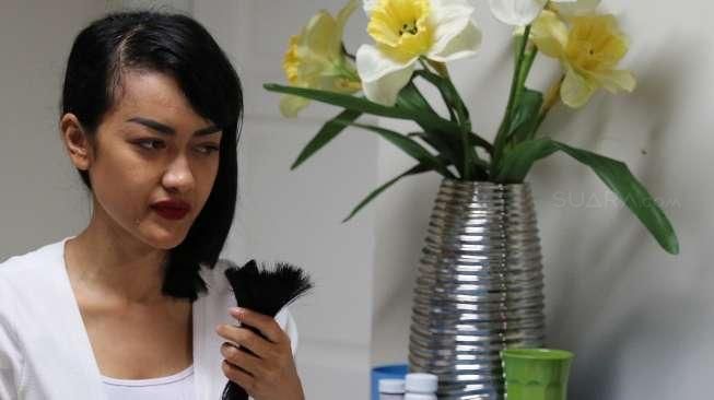 Ada Filosofi  di Balik Jupe Potong Rambut  Panjangnya