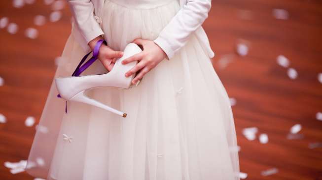 Ilustrasi pernikahan dini. (Shutterstock)