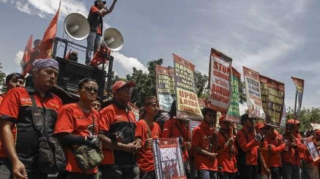 Tuntut Bebaskan Tahanan Buruh