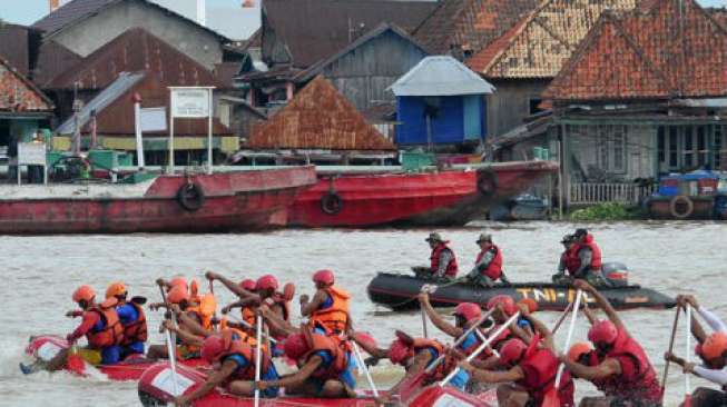 Singapura Juara Rafting Musi Triboatton