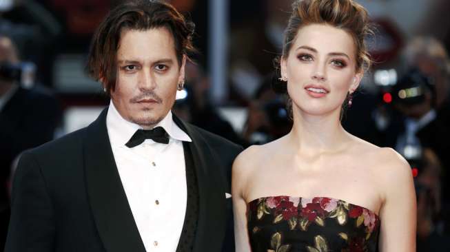 Amber Heard Panggil Polisi karena Johnny Depp Berulah