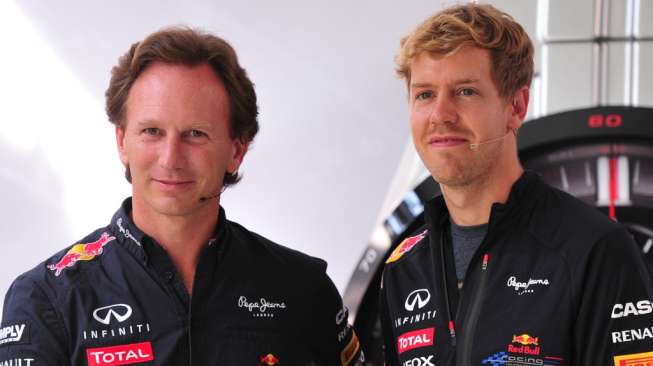 Prinsipal Red Bull Racing, Christian Horner (kiri), kemudian Sebastian Vettel ketika keduanya masih kerja bareng di dalam Red Bull [AFP/Giuseppe Cacace]