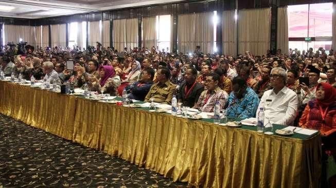 Menteri Dalam Negeri Tjahjo Kumolo membuka acara sosialisasi Peraturan Pemerintah No. 18 di Hotel Mercure, Jakarta, Jumat (5/8). [Suara.com/Oke Atmaja]