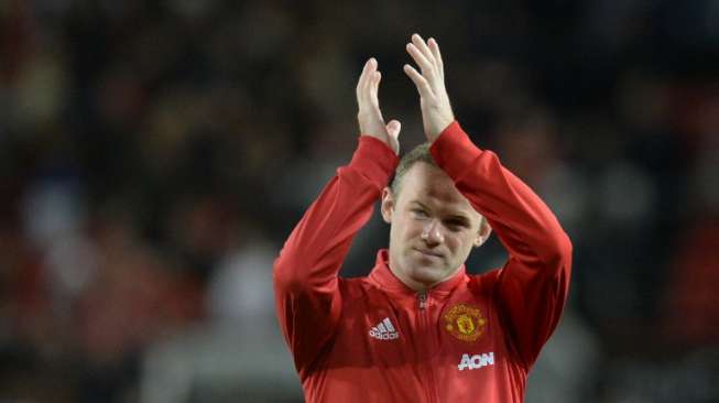 Kapten dan striker Manchester United Wayne Rooney. OLI SCARFF / AFP