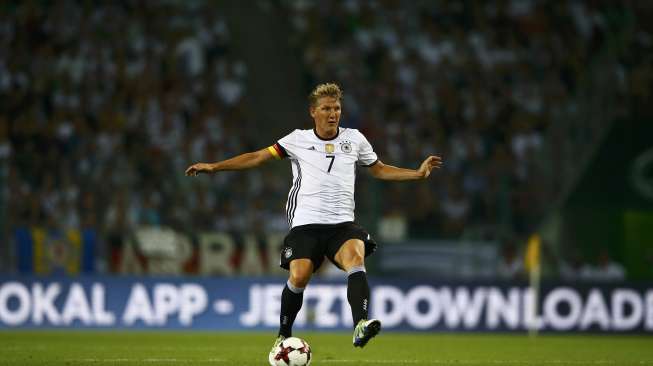 Bastian Schweinsteiger beraksi di laga terakhirnya bersama Jerman [Reuters]