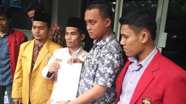 Mengapa Mereka Serempak Laporkan Ahok ke Polisi?