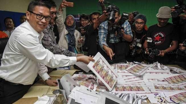 Pengungkapan Sindikat Pengedar Uang Palsu