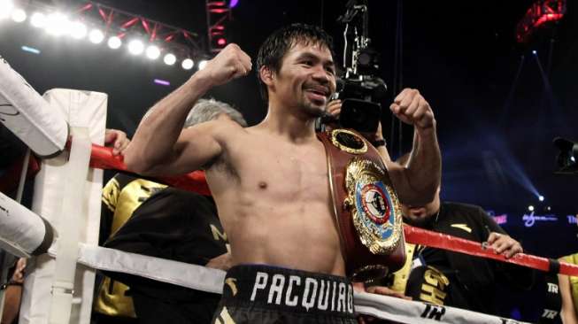 Petinju Filipina Manny Pacquiao usai mengalahkan Jessie Vargas, (6/11). (AFP)