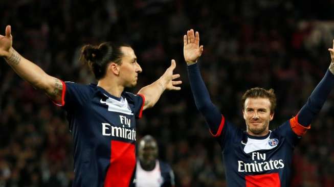 Zlatan Ibrahimovic dan David Beckham saat keduanya masih sama-sama memperkuat Paris Saint-Germain (PSG) [AFP/Kenzo Tirbouillard]