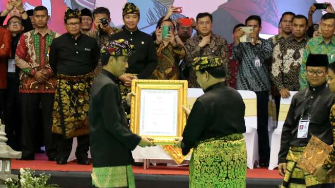 Jokowi didaulat sebagai Pendekar Utama Pencak Silat [Suara.com/Syaiful Rachman]