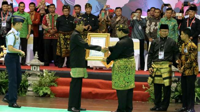 Jokowi didaulat sebagai Pendekar Utama Pencak Silat [Suara.com/Syaiful Rachman]