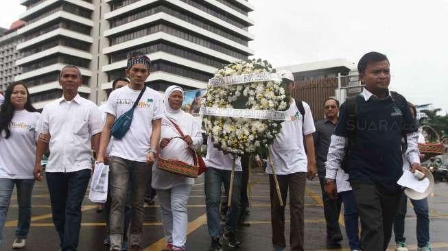 Peringatan satu tahun Tragedi Bom Thamrin 14 Januari 2016, di Pos Polisi Perempatan Sarinah, Jalan MH Thamrin, Jakarta, Sabtu (14/1).