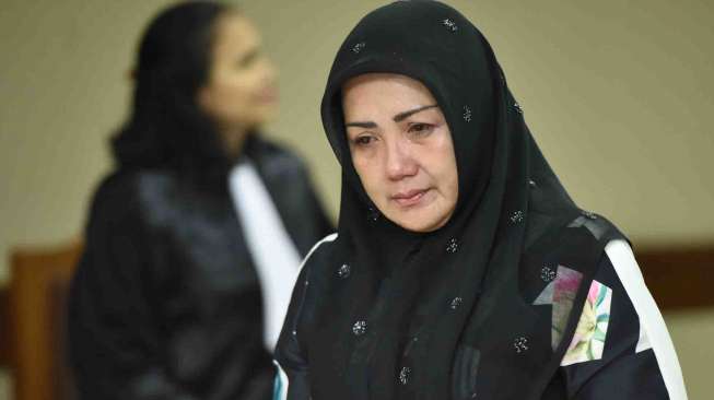 Majelis hakim menjatuhkan hukuman satu tahun delapan bulan.