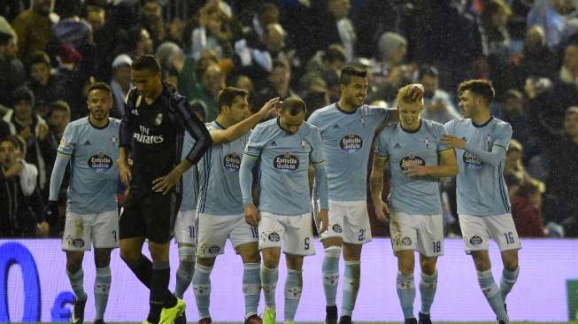 Para pemain Celta Vigo merayaka gol Daniel Wass ke gawang Real Madrid di Copa del Rey. MIGUEL RIOPA / AFP