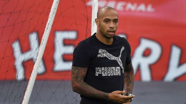 Mantan striker Arsenal dan timnas Prancis Thierry Henry. PUNIT PARANJPE / AFP