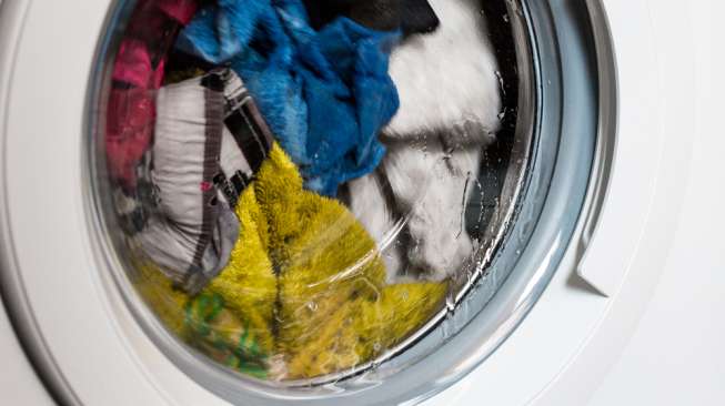 Pakaian di dalam mesin cuci [shutterstock]