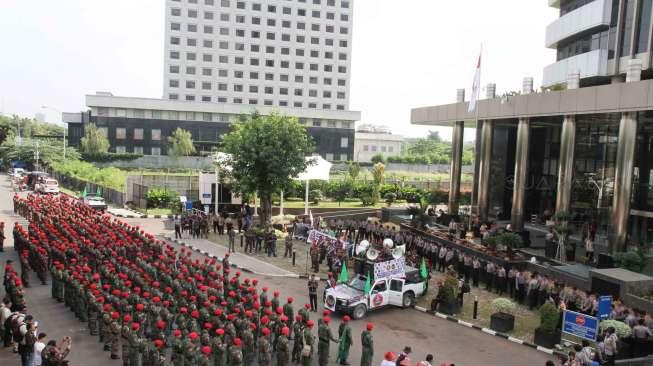 Pemuda Muhammadiyah  menuntut pengusutan tuntas kasus korupsi e-KTP.