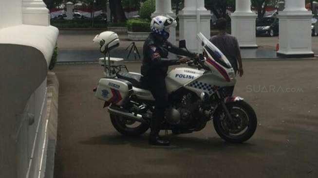 Telat, Menteri Susi Numpang Motor Polisi ke Istana