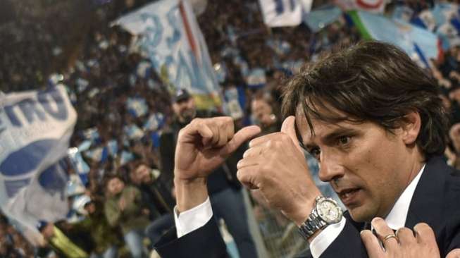 Pelatih Lazio Simone Inzaghi merayakan sukses skuatnya ke final Coppa Italia. ANDREAS SOLARO / AFP