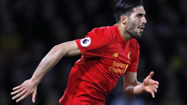 Gelandang Livepool asal Jerman Emre Can merayakan golnya ke gawang Watford. Adrian DENNIS / AFP