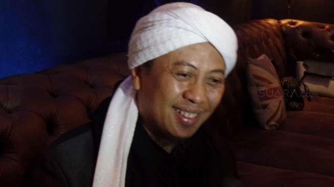 Penyanyi religi Opick. [suara.com/Ismail]