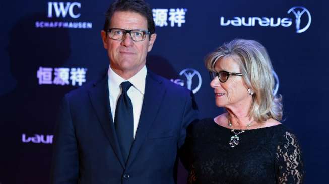 Fabio Capello bersama isterinya, Laura, menghadiri sebuah acara di Cina [AFP]