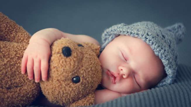 Ilustrasi bayi tidur. (Shutterstock)