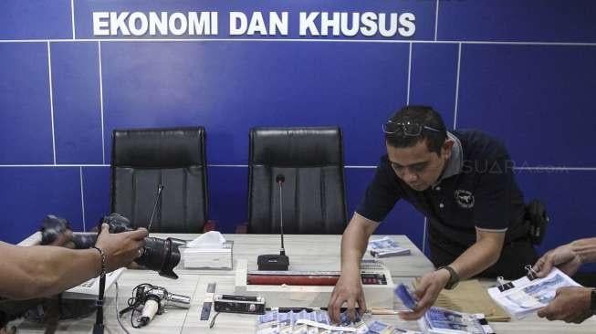 Tindak Pidana Ekonomi dan Khusus Bareskrim Polri merilis peredaran uang palsu di, Jakarta, Jumat (16/6).