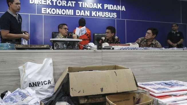 Tindak Pidana Ekonomi dan Khusus Bareskrim Polri merilis peredaran uang palsu di, Jakarta, Jumat (16/6).