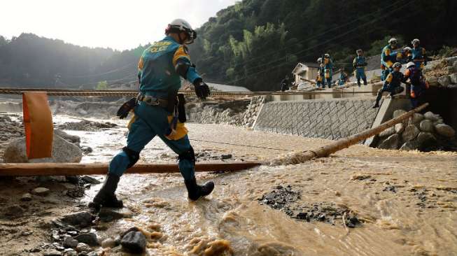 Kerusakan parah yang diakibatkan oleh bencana banjir di Perfektur Fukuoka dan Ota, Minggu (9/7/2017). (AFP)