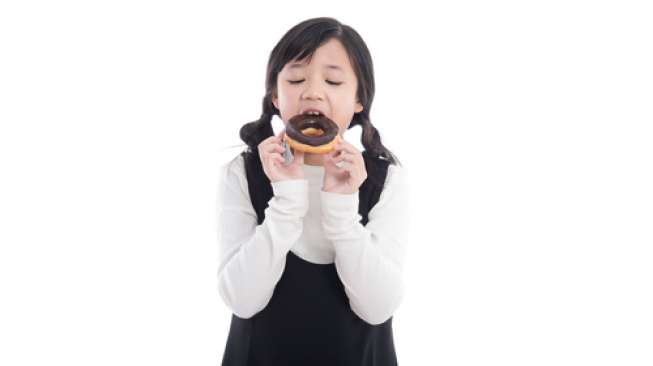 Donat merupakan salah satu makanan manis yang digemari anak-anak. (Shutterstock)