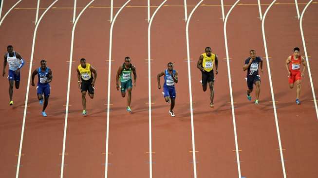 Sprinter kenamaan asal Jamaika, Usain Bolt, usai mengikuti final lari 100 meter putra di Kejuaraan Dunia Atletik 2017 di Olympic Stadium, London, Inggris, Sabtu (5/8). [AFP/Daniel Leal-Olivas]