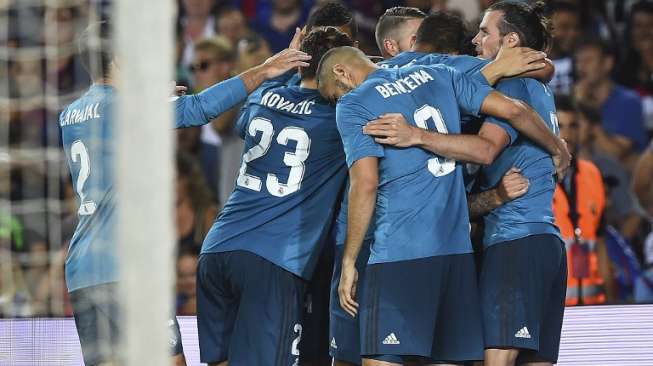 Pemain Real Madrid rayakan gol ke gawang Barcelona [AFP]