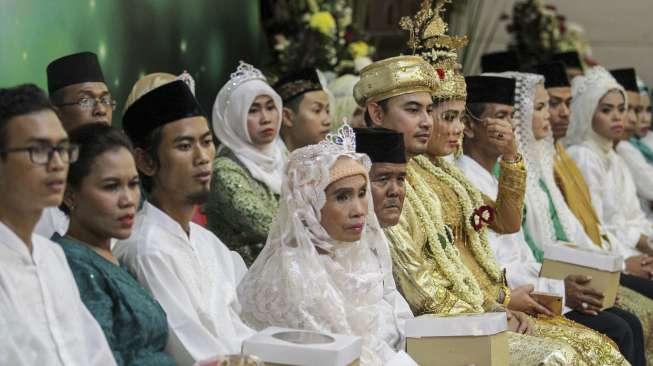 Partai Kebangkitan Bangsa (PKB) menggelar acara nikah massal di Jakarta, Jumat (25/8).