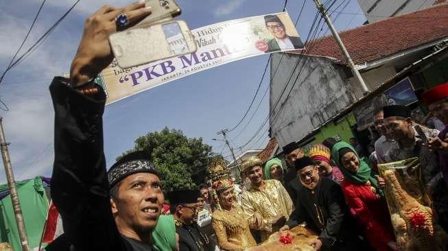 Partai Kebangkitan Bangsa (PKB) menggelar acara nikah massal di Jakarta, Jumat (25/8).