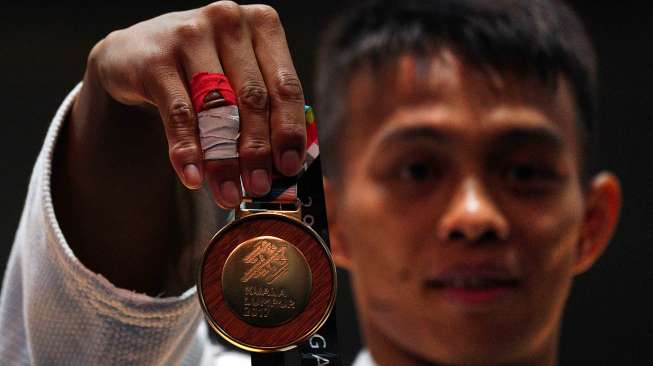 Setelah mengalahkan judoka Vietnam Tan Cong Nguyen. 