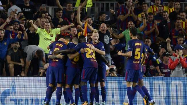 Barcelona membantai Juventus di laga perdana Grup D Liga Champions 2017/18. Dalam laga yang berlangsung di Camp Nou, Barca menang telak 3-0 [AFP]