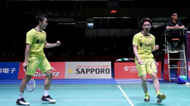 Pasangan ganda putra Indonesia, Kevin Sanjaya Sukamuljo/Marcus Fernaldi Gideon, menjuarai Jepang Open Super Series 2017, Minggu (24/9). [Humas PBSI]