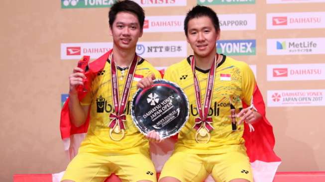 Pasangan ganda putra Indonesia, Kevin Sanjaya Sukamuljo/Marcus Fernaldi Gideon, menjuarai Jepang Open Super Series 2017, Minggu (24/9). [Humas PBSI]