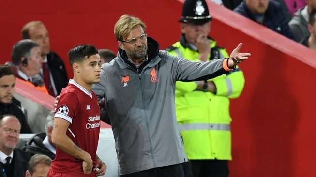 Pemain Liverpool Philippe Coutinho mendapat arahan dari manajer Jurgen Klopp [AFP]