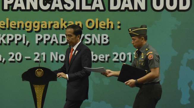 Presiden Joko Widodo menghadiri Simposium Nasional Kebudayaan di Jakarta, Senin (20/11).