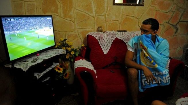 Reaksi fans saat menyaksikan el Clasico [AFP]
