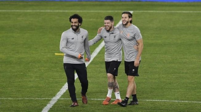 Pemain Liverpool (kiri-kanan) Mohamed Salah, Alberto Moreno dan Adam Lallana [AFP]