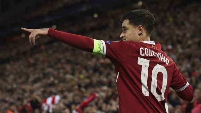 Philippe Coutinho rayakan golnya ke gawang lawan [AFP]