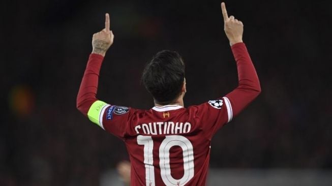 Philippe Coutinho rayakan golnya ke gawang lawan [AFP]