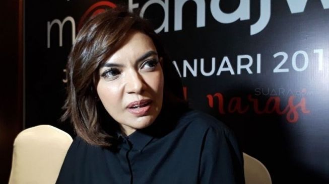 Najwa Shihab ditemui di sela-sela jumpa pers kembalinya program talkshow Mata Najwa, di kawasan Tendean, Jakarta Selatan, Senin (8/1/2018) [suara.com/Ismail].