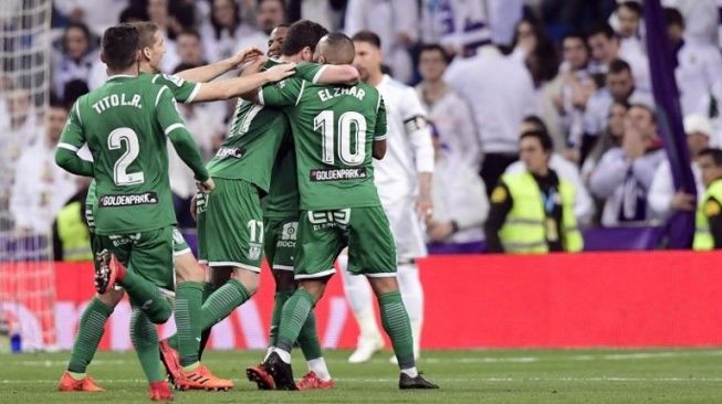 Para pemain Leganes merayakan kemenangannya atas Real Madrid di Copa del Rey. JAVIER SORIANO / AFP