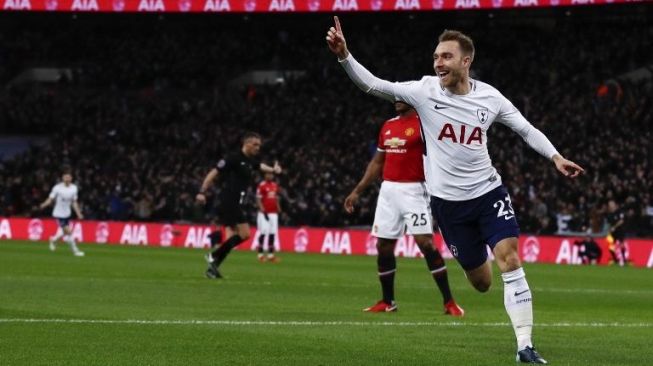 Pemain Tottenham Hotspur Christian Eriksen rayakan golnya ke gawang Manchester United [AFP]