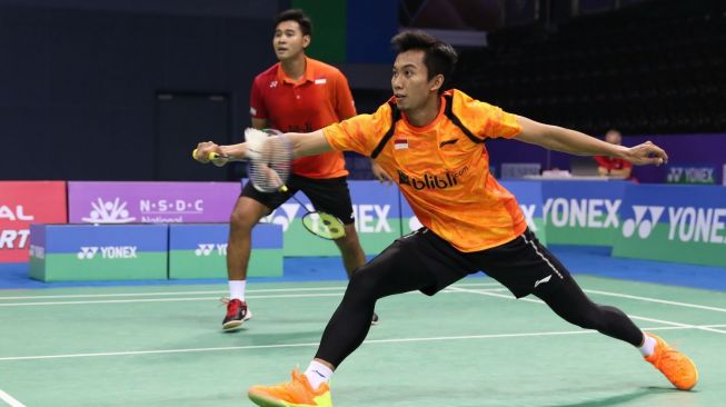 Pasangan ganda putra Indonesia, Angga Pratama/Rian Agung Saputro, tersingkir di perempat final India Open 2018, Jumat (2/2). [Humas PBSI]